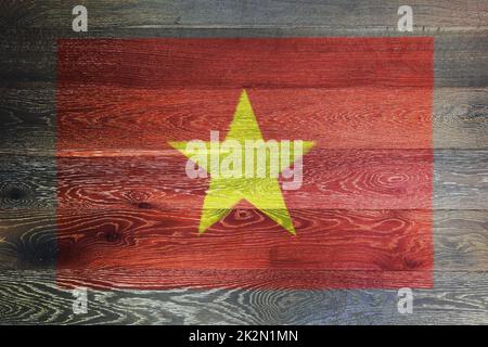 Vietnam-Flagge auf rustikalem alten Holz Oberfläche Hintergrund Stockfoto