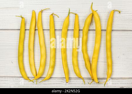 Tischplatte - gelb String (Wachs) Bohnen auf Whiteboards. Stockfoto