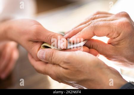 Bestechungsgeld In Dollar Stockfoto