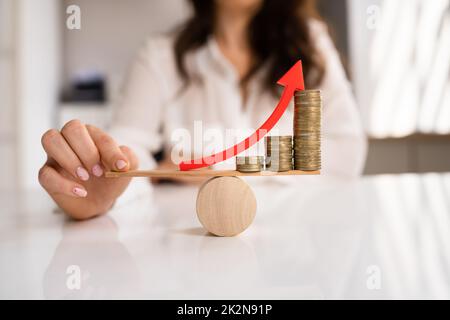 Geldverschuldung Und Inflationsbilanz Stockfoto