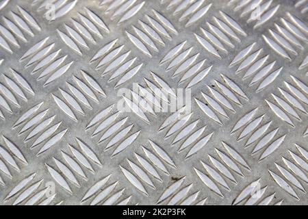 Metallischer Hintergrund mit rutschfester Struktur Stockfoto