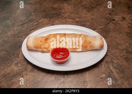 Köstliches Italienisches Stromboli Stockfoto