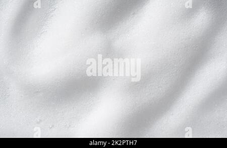 Schaumstoffblase aus Seife oder Shampoo-Waschanlage in der Draufsicht. Stockfoto