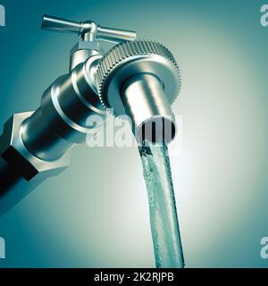 Metallhahn mit strömendem Wasser. Stockfoto