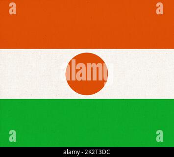 Flagge von Niger. Stoffstruktur. Nationales Symbol. Stockfoto