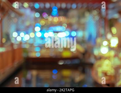 Verschwommenes Einkaufszentrum oder Kaufhaus Innenhintergrund Bokeh Licht Stockfoto