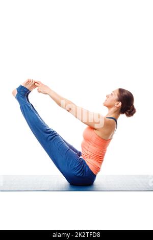 Schön sportlich fit Frau Praktiken Yoga Asana Ubhaya padangust Stockfoto