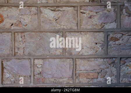 Backstein Wand Hintergrund und Textur. Alte Backsteinmauer in einem Hintergrundbild Stockfoto