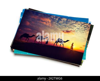 Stapel von Urlaubsfotos isoliert Stockfoto