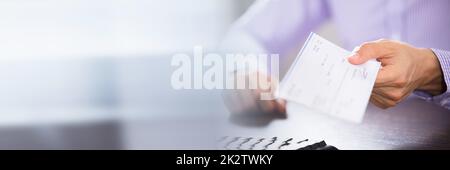 Der Unternehmer Hand prüfen Stockfoto