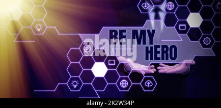 Inspiration mit dem Schild Be My Hero. Geschäftsidee Bitte von jemandem um heldenhafte Aktionen für ihn Geschäftsmann im Anzug, der ein Tablet hält, das für erfolgreiche Teamarbeit steht. Stockfoto