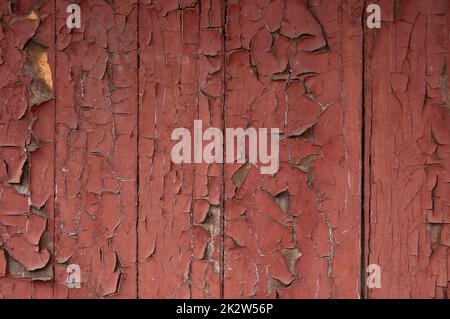 Grunge Hintergrund: Abgestreifte alte Bretter mit roter Farbe bemalt Stockfoto