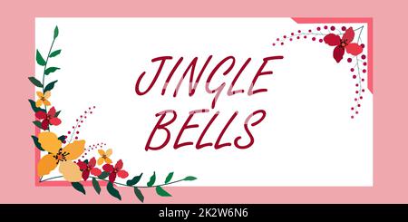 Handschriftlich auf dem Schild "Jingle Bells". Konzeptfoto berühmtester traditioneller Weihnachtssong auf der ganzen Welt Rahmen mit farbenfrohen Blumen und Blattwerk harmonisch gestaltet. Stockfoto