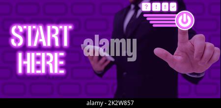 Konzeptionelle Beschriftung: Beginnen Sie hier. Geschäftliche Idee, jemandem zu sagen, dass dies der Anfangspunkt für den Weg vom Ziel ist, Frau im Anzug, die einen Stift hält, symbolisiert erfolgreiche Teamarbeit. Stockfoto