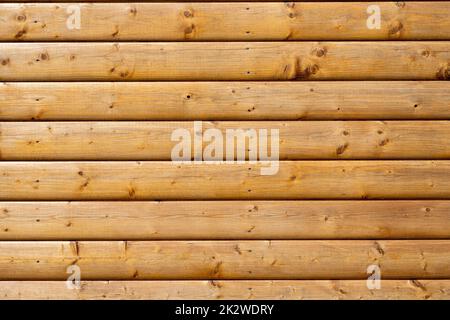 Hintergrund einer Wand aus bemalten Holzbohlen Stockfoto