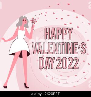 Handschrifttext HAPPY VALENTINES DAY 2022. Business-Konzept Weiß und Pink Valentinstag dekoratives Band Tag der Liebenden Frau bläst Blumen und zeigt friedliche romantische Natur. Stockfoto