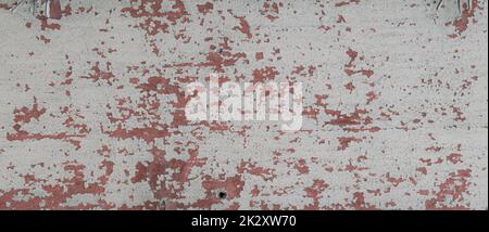 Ein abstrakter, schäbiger Hintergrund mit weißen Rissen Stockfoto