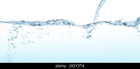 Wasserleitung und Wasserstrahl Stockfoto