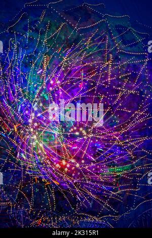 Bunte Lichter der Spinning Vergnügungspark Fahrt Stockfoto