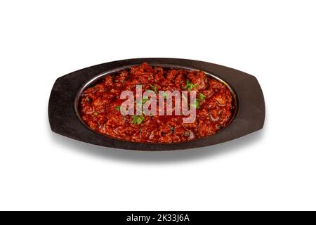 Kheema / Keema oder Khima ist ein würziges Gericht aus gehacktem Huhn oder Lamm mit Zwiebeln, Tomaten, serviert mit Brötchen gekocht. Selektiver Fokus Stockfoto