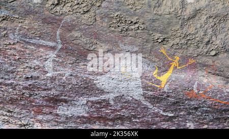 Felskunst der Aborigines: Känguru wird gejagt - Mann mit einer spießgelben Frau. Anbangbang-Burrungkuy-Australia-200 Stockfoto