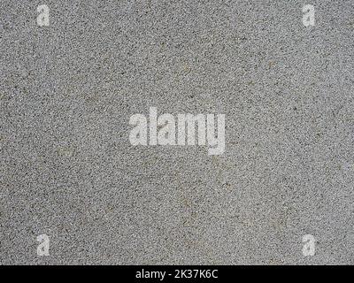 Graue Kieselsteine Textur Hintergrund. park oder Spielplatz Bodenbelag Material Stockfoto