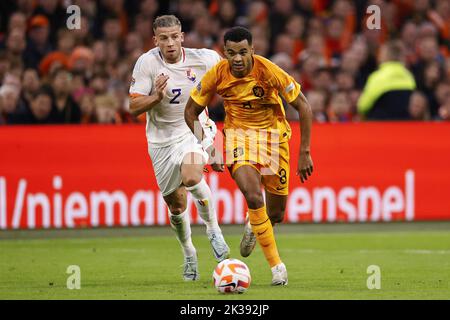 Amsterdam, Niederlande. 25. September 2022. AMSTERDAM - (LR) Toby Alderweireld aus Belgien, Cody Gakpo aus Holland während des Spiels der UEFA Nations League zwischen den Niederlanden und Belgien in der Johan Cruijff Arena am 25. September 2022 in Amsterdam, Niederlande. ANP MAURICE VAN STEEN Kredit: ANP/Alamy Live Nachrichten Stockfoto