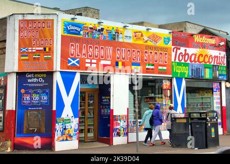 Multikulturelle Geschäfte auf dem gallowgate barras Markt oder den Barrows Glasgow, Schottland, Großbritannien Stockfoto