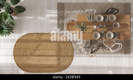 Esstisch aus Holz mit Tischeinstellung in Weiß- und Beigetönen. Juteppich, Topfpflanzen. Skandinavisches Boho-Interieur. Draufsicht, Plan Stockfoto