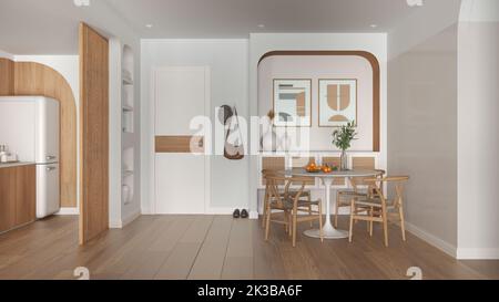 Modernes Esszimmer und Küche in Weiß- und Holztönen, runder Tisch mit Stühlen, Rattan-Kommode, Eingangstür mit Kleiderbügel. Parkett und Stockfoto