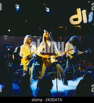 Disco, ZDF Musiksendung, Deutschland, 1978, Status Quo, britische Rock Band mit Gitarrist und Sänger Francis Rossi, Mitte. Disco, TV-Musikshow, Deutschland, 1978, Status Quo, Britische Rockgruppe mit Gitarrist und Sänger Francis Rossi, Mitte. Stockfoto