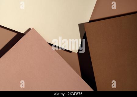 Pastellpapier überlappen in beige, braun und Terrakotta-Farben für Hintergrund, Banner, Präsentationsvorlage. Kreatives, trendiges Hintergrunddesign in natürlichen Farben. Hintergrund im stil von 3D. Stockfoto