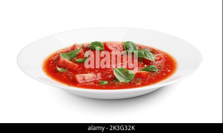 Platte mit leckeren Tomatensuppe isoliert auf weißem Hintergrund Stockfoto