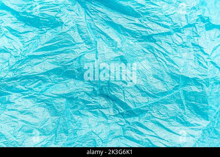 Zerknittert Papier Kunst texturierten Hintergrund blau farbig gefaltet abstrakten Boden Stockfoto