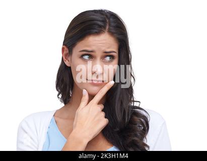 Angenehm überrascht. Studioaufnahme einer überraschten jungen Frau, isoliert auf Weiß. Stockfoto