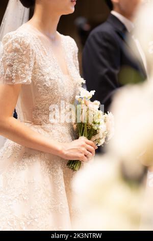 Wunderschöne Braut in einem schönen Kleid. Hochzeitstag. Stockfoto