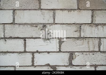 Wand aus Porenbeton, Schaumbeton, Zellbeton. Hintergrund Der Bauarbeiten. Stockfoto