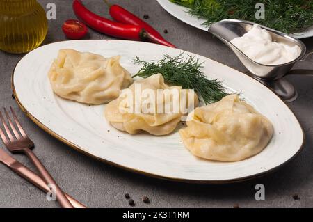 Leckere Manti oder Manty Knödel, beliebte asiatische Gericht, großes Bild für Ihre Bedürfnisse. Stockfoto