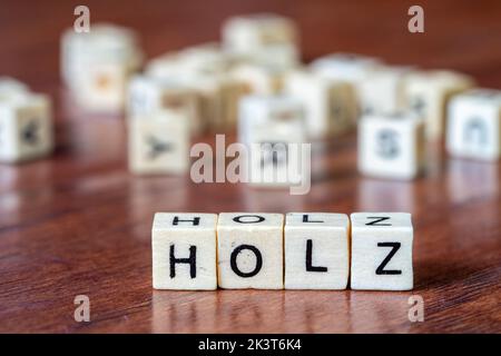 Das Wort Holzbuchstaben isoliert Stockfoto
