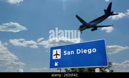 Flugzeug Silhouette Landung in San Diego, Kalifornien, USA. Ankunft in der Stadt mit dem internationalen Flughafen Richtung Schild und blauem Himmel. Reisen, Reisen und Stockfoto