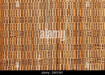 Bambusrohr mattiert, natürliche Hintergrundstruktur Nahaufnahme Stockfoto