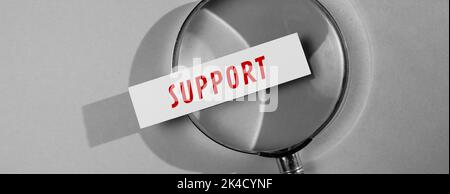 Nahaufnahme einer Geschäftsidee mit Unterstützung Stockfoto