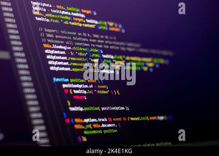 Komprimierter, farbiger Code-Hintergrund. Web-Programmierung mit Javascript-Codierung Stockfoto