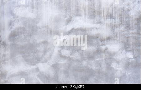 Detail einer verputzten Wand mit abstraktem weißgrauem Muster Stockfoto