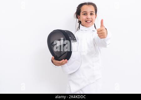 Kleines Mädchen in einem Fechtanzug Stockfoto