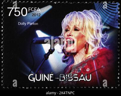 Dolly Parton auf Briefmarke von Mosambik Stockfoto