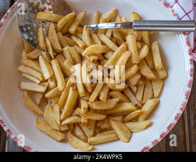 Hausgemachte pommes Frites in einer Schüssel Stockfoto