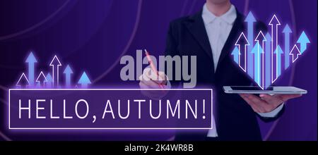 Handschriftentext Hallo, Herbst. Wort für Begrüßung, das verwendet wird, wenn man den Wechsel von Sommer zu Winter annimmt Stockfoto