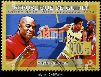 Magic Johnson in Aktion auf afrikanischer Briefmarke Stockfoto