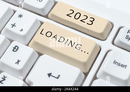 Konzeptionelle Bildunterschrift 2023 Loading.... Wort für ein Jahr, das aus einer Reihe von Ereignissen besteht, die noch andauernd sind Stockfoto